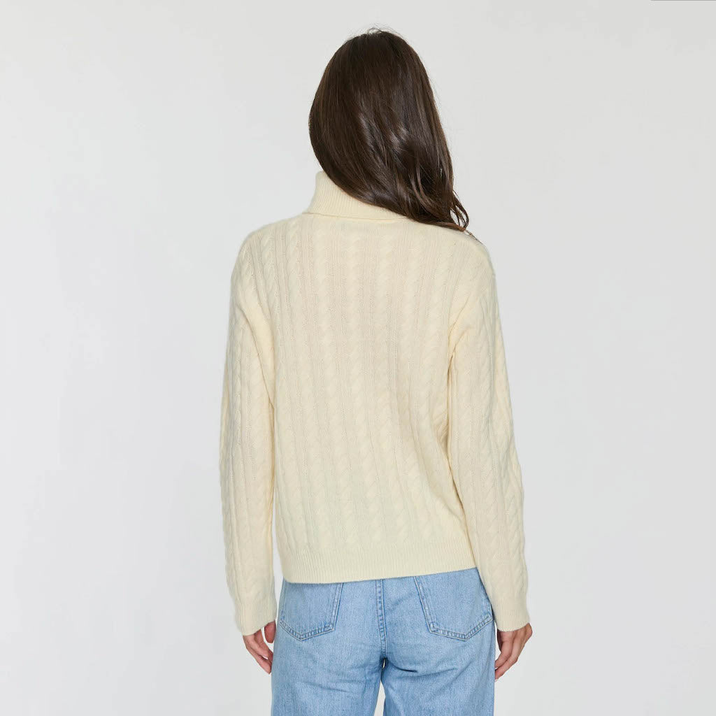 TWISTED CABLE TURTLENECK